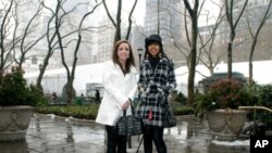 Brittney Paulson (left) and Arianna Janelle Moultrie (right), grand prize winners of the Passion for Fashion Competition 2010, attended New York City Fashion Week.