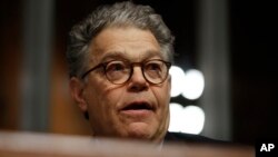 Senate Judiciary Committee member Sen. Al Franken, D-Minn., pauses during a Senate Judiciary Committee hearing on Capitol Hill in Washington, Nov. 15, 2017. 