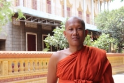 Venerable, Sarin Samnang, 40, who has been monk for more than 20 years, says Sampov Meas pagoda in Phnom Penh has not yet seen any effect on food supplies due to the outbreak of COVID-19. (Phorn Bopha/VOA)