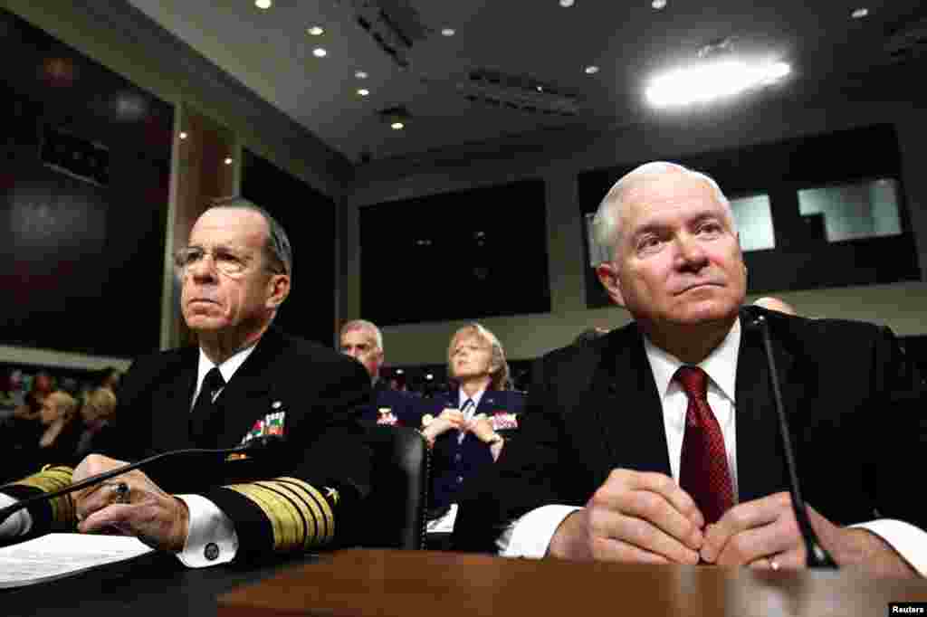 U.S. Secretary of Defense Robert Gates (R) and Chairman of the Joint Chiefs of Staff Admiral Mike Mullen testify before the Senate Arms Services Committee hearing about the "Don't Ask, Don't Tell" policy on gays serving in the military in Washington Decem