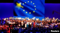 FILE - Annegret Kramp-Karrenbauer, Chairwoman of Germany's CDU, Markus Soeder, CSU leader and Manfred Weber, the EU candidate of the two German conservative sister parties kick off their campaign for the European elections in Muenster, Germany, April 27, 2019. 