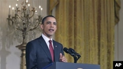President Barack Obama makes a statement on Libya in the East Room of the White House in Washington, March 18, 2011