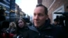 Harvard University professor Charles Lieber is surrounded by reporters as he leaves the Moakley Federal Courthouse in Boston, Jan. 30, 2020. 