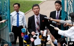 Ri Tong Il, former North Korean deputy ambassador to the United Nations, speaks to journalist outside the North Korean embassy in Kuala Lumpur, Malaysia on Thursday, March 2, 2017