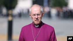 FILE - The Archbishop of Canterbury Justin Welby walks through Westminster in London on Sept. 14, 2022.