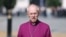 FILE - The Archbishop of Canterbury Justin Welby walks through Westminster in London on Sept. 14, 2022.