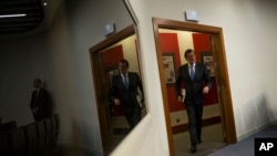 Spain's acting Prime Minister Mariano Rajoy arrives for a news conference after his meeting with Spain's King Felipe IV, at the Moncloa palace in Madrid, Tuesday, April 26, 2016.