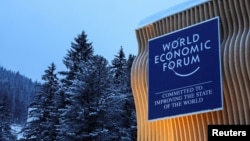 FILE - The World Economic Forum logout is seen in Davos, Switzerland, Jan. 19, 2024.