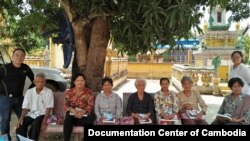 The Documentation Center of Cambodia team with Dr. Demosthenes C. Reyes, left, and Kim Sovandany, right, on a home visit to provide health care for former complainants and civil parties to the Khmer Rouge Tribunal, at Lor-lork Sar Thmey Pagoda, Pursat province, Cambodia, April 2018. (Courtesy of Documentation Center of Cambodia)