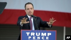 FILE - Reince Priebus, chairman of the Republican National Committee, speaks at a campaign rally for then presidential candidate Donald Trump at Bayfront Park Amphitheater, Nov. 2, 2016, in Miami, Florida. Priebus, now Trump's incoming chief of staff, has said of claims of Russian meddling in the U.S. election that "this whole thing is a spin job."