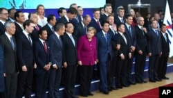 European Union and Asian leaders pose for a group photo during an EU-ASEM summit in Brussels, Oct. 19, 2018.