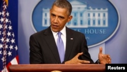 미국의 바락 오바마 대통령이 14일 백악관에서 새 건강보험에 관한 기자회견을 갖고 있다. 