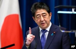 Japan's Prime Minister Shinzo Abe speaks during a press conference at the prime minister's official residence in Tokyo, Sept. 25, 2017.