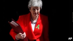 Britain's Prime Minister Theresa May leaves 10 Downing Street in London, May 15, 2019.