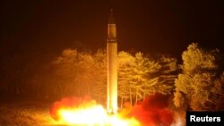 A Hwasong-14 intercontinental ballistic missile is pictured during its second test-fire in this undated picture provided by KCNA in Pyongyang, North Korea, on July 29, 2017.