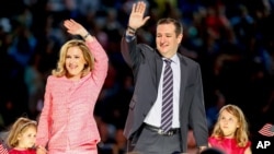 Sen. Ted Cruz, R-Texas, his wife Heidi, and their two daughters Catherine, 4, left, and Caroline, 6, right, wave on stage after he announced his campaign for president, Monday, March 23, 2015, at Liberty University, founded by the late Rev. Jerry Falwell, in Lynchburg, Va. Cruz, who announced his candidacy on twitter in the early morning hours, is the first major candidate in the 2016 race for president. (AP Photo/Andrew Harnik)