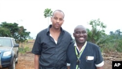 Soleman Liban (L) Presidential Adviser to Gabon's President With VOA's Peter Clottey at Nkok during a visit to the Special Economic Zone project several kilometers outside the capital, Libreville.