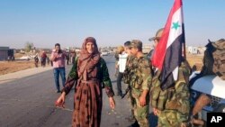 Suriye Devlet Televizyonu, Esat birliklerinin Tel Tamer'e girdiğini gösteren fotoğraflar yayınladı