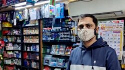 Sanjay Kapur, owner of a stationery store in the business hub of Gurugram, says business remains sluggish as most offices and schools still remain shut. (Anjana Pasricha/VOA)