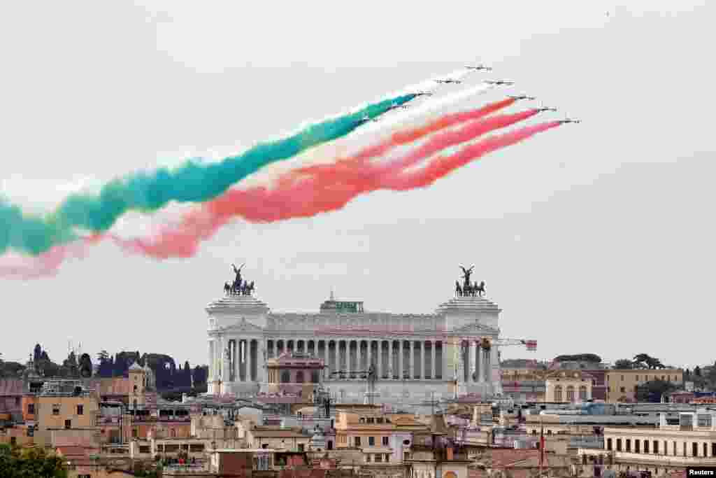 The aerobatic demonstration team of the Italian Air Force, the Frecce Tricolori (Tricolor Arrows), performs over the city on Republic Day, in Rome.