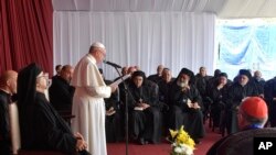 Pope Francis delivers his speech during a meeting with the clergy and religious, in Cairo, Saturday, April 29, 2017.