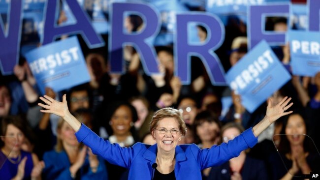 FILE -Sen. Elizabeth Warren, D-Mass., gives her victory speech at a Democratic election watch party in Boston, Nov. 6, 2018.