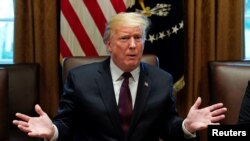 U.S. President Donald Trump leads a discussion on immigration proposals with conservative leaders in the Cabinet Room of the White House in Washington, Jan. 23, 2019.