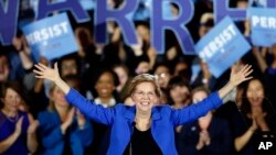 FILE -Sen. Elizabeth Warren, D-Mass., gives her victory speech at a Democratic election watch party in Boston, Nov. 6, 2018. 