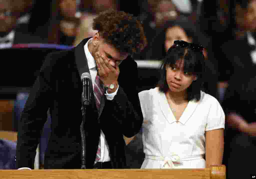 Jordan Franklin, left, pauses alongside his sister Victorie Franklin while speaking about their grandmother, Aretha Franklin, during the funeral service for the legendary singer at Greater Grace Temple in Detroit, Aug. 31, 2018.