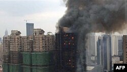 Şanxay şəhərindəki çoxmərtəbəli binada yanğın baş verib