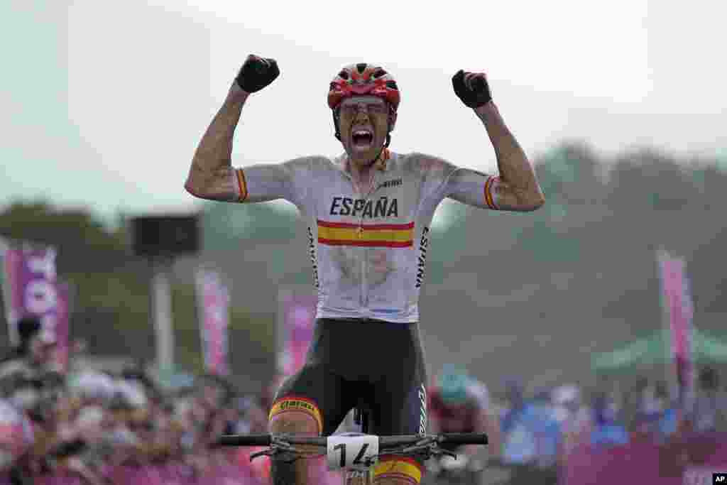 David Valero Serrano of Spain reacts as he wins the bronze medal during the men&#39;s cross country mountain bike competition at the 2020 Summer Olympics in Izu, Japan.