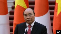 Vietnamese Prime Minister Nguyen Xuan Phuc orders a halt to work on a major steel plant, citing environmental and other concerns.