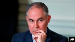 FILE - Environmental Protection Agency Administrator Scott Pruitt attends a meeting at the White House in Washington, Feb. 12, 2018. 