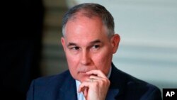 Environmental Protection Agency Administrator Scott Pruitt attends a meeting at the White House in Washington, Feb. 12, 2018. Trump is offering his support to the head of the Environmental Protection Agency who is at the center of ethics questions. 