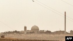 FILE - A picture taken on March 8, 2014, contains a partial view of the Dimona nuclear power plant in the southern Israeli Negev desert. 
