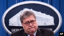 Attorney General William Barr speaks during a news conference, Dec. 21, 2020, at the Justice Department in Washington. (Michael Reynolds/Pool via AP)