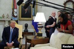 U.S. President Donald Trump speaks while meeting with Pakistan’s Prime Minister Imran Khan in the Oval Office at the White House in Washington, July 22, 2019.