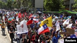 Workers take part in a national strike during ongoing protests against Chile's government, in Santiago, Chile, Nov. 26, 2019.