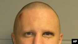 Tuscon shooting rampage suspect Jared Lee Loughner is pictured in this undated booking photograph released by the U.S. Marshals Service on February 22, 2011