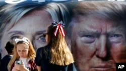 Photographie des deux candidats à l'élection présidentielle américaine, à New York, le 26 septembre 2016.