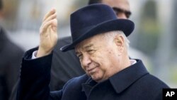 FILE - Uzbek President Islam Karimov is seen in Samarkand, Uzbekistan, Nov. 1, 2015. Karimov's daughter, Lola Karimova, posted a message Monday on Instagram, saying her father suffered a brain hemorrhage Saturday but is in stable condition in intensive care.