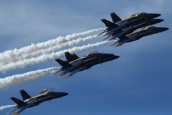 FILE - The US Navy Blue Angels will do a flight demonstration during the Fourth of July.