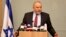 Israeli Defense Minister Avigdor Lieberman delivers a statement at the Knesset, Israel's Parliament, in Jerusalem, Wednesday, Nov. 14, 2018.