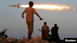 Fighters of Libyan forces allied with the U.N.-backed government fire a rocket at Islamic State fighters in Sirte, Libya, Aug. 4, 2016. President Obama recently said the fight against the Islamic State must be wage beyond the battlefield as well.