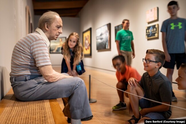 School children look at art at the Crystal Bridges Museum of American Art, Bentonville, Arkansas