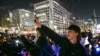 People take part in a protest calling for the ouster of South Korean President Yoon Suk Yeol outside the National Assembly in Seoul on Dec. 7, 2024.