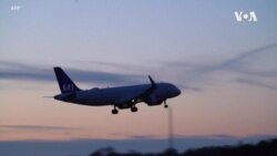 VOA英语视频: 航空旅游业再出发 重重限制行路难