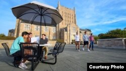 Students walk across campus at the University of Tulsa in Tulsa, Oklahoma.