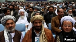 Members of the Loya Jirga, grand council, attend during the last day of the Loya Jirga, in Kabul, Nov. 24, 2013.