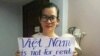 Nhà hoạt động Đinh Thị Thu Thuỷ với biểu ngữ "Việt Nam is not for rent or sale to China" để phản đối dự luật Đặc khu và An ninh mạng vào năm 2018.